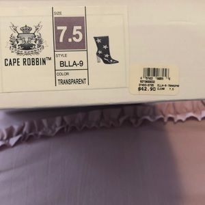 Clear boots with purple stars. Never worn.